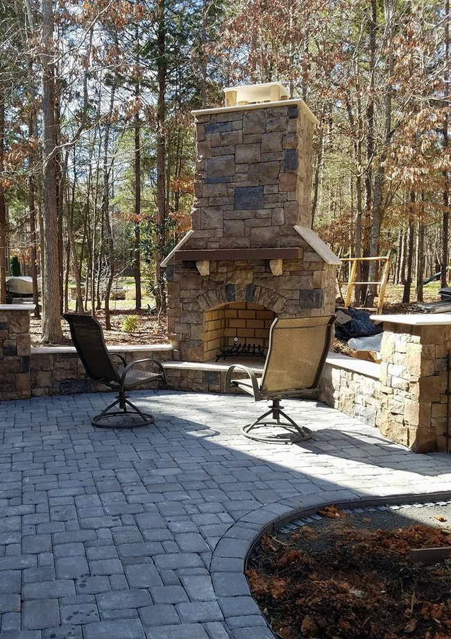 Picture Lake Norman NC outdoor living kitchen space fire pits fireplaces
